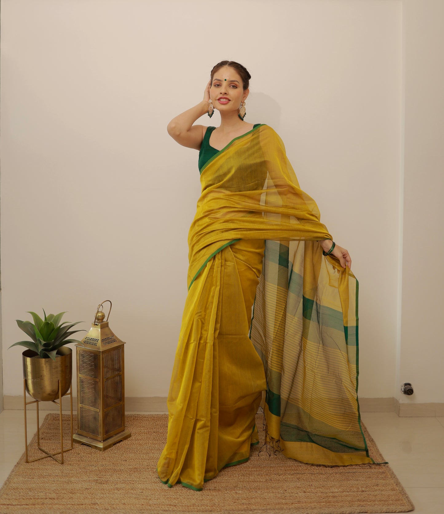 Mustard and green maheshwari saree