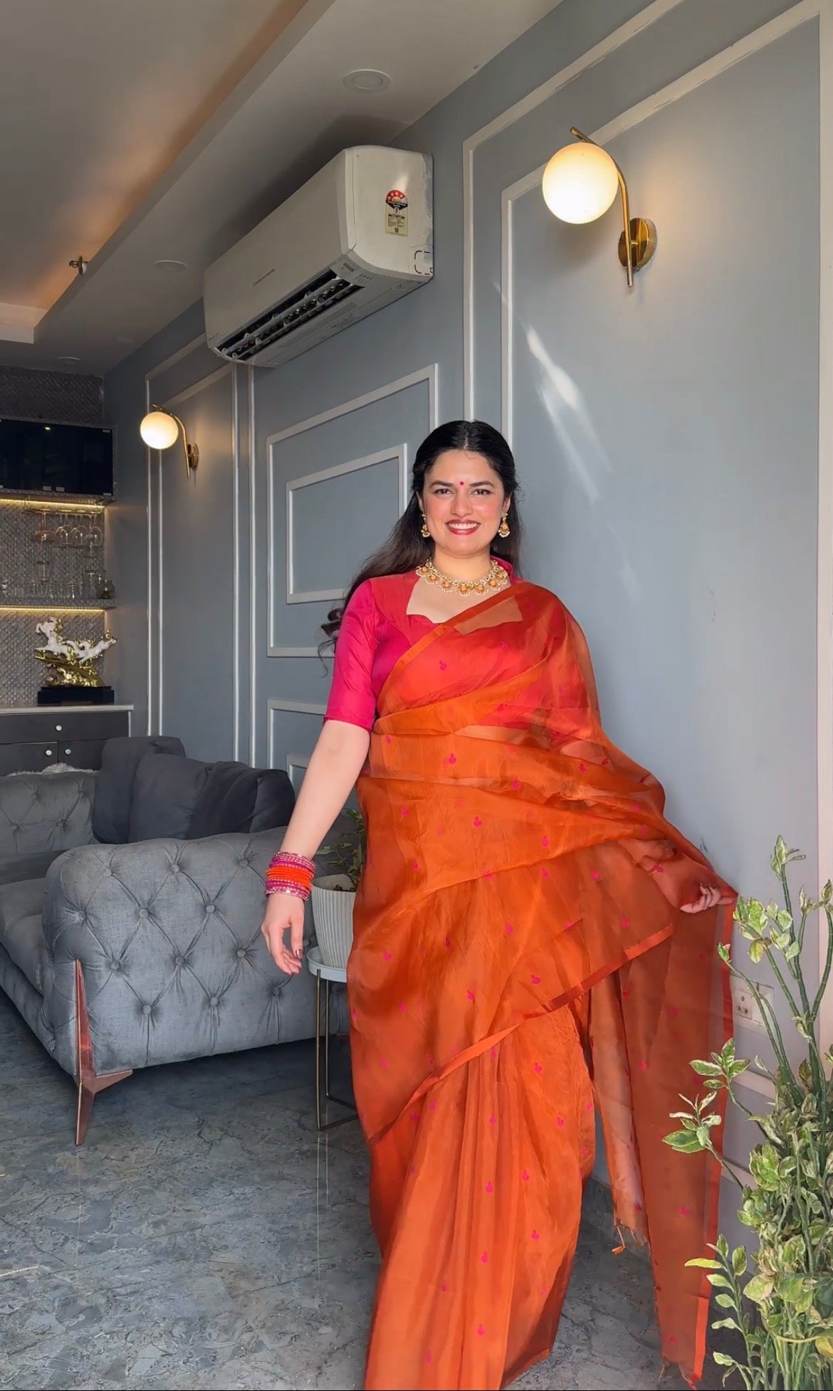 Burnt orange and pink Chanderi silk saree with resham bootis all over