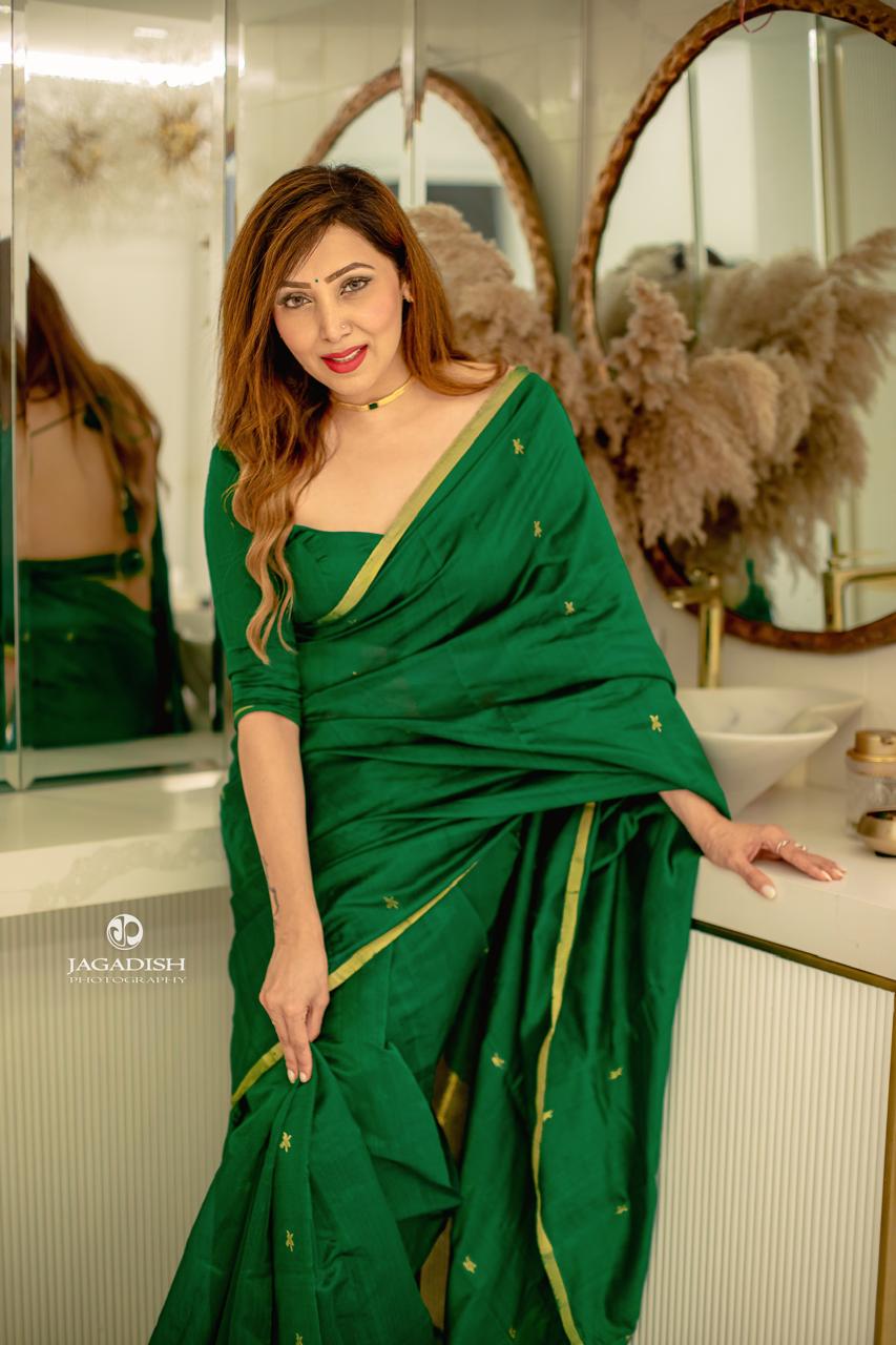 Emerald green chanderi silk saree with flower bootis all over
