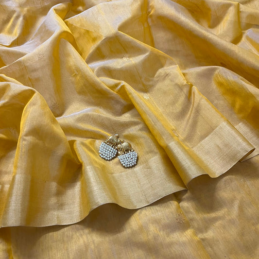 Mustard yellow Chanderi saree with zari bootis all over and flower motifs on pallu