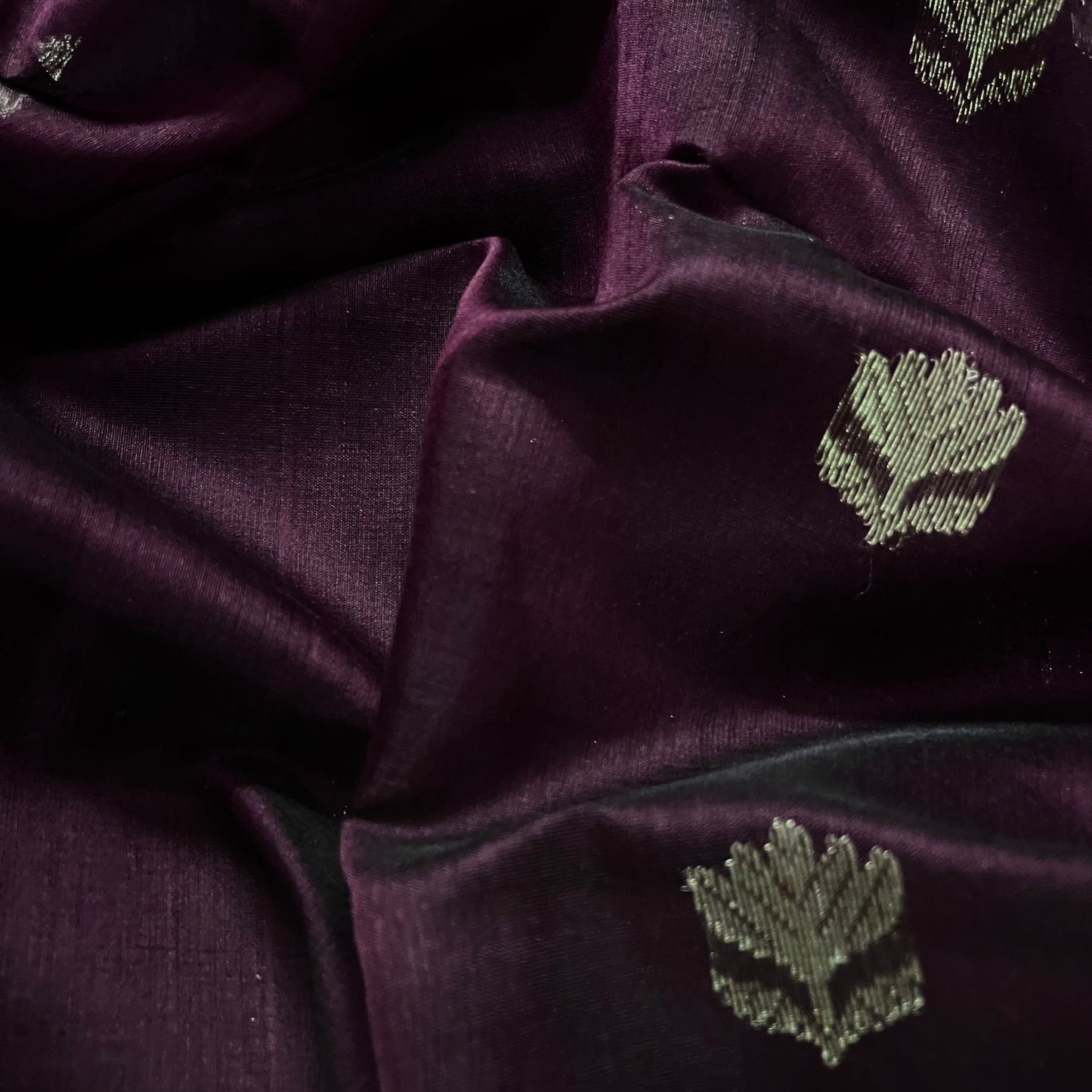 Deep wine Maheshwari saree with flower motifs all over