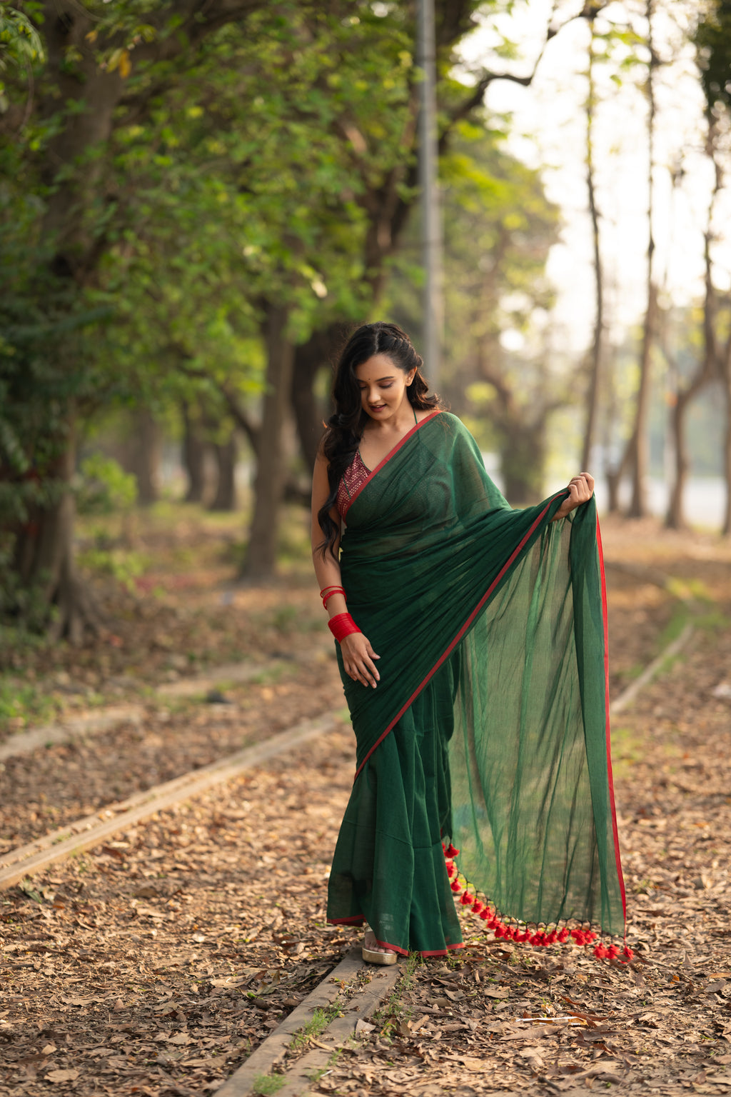 Dark green and red mulmul saree