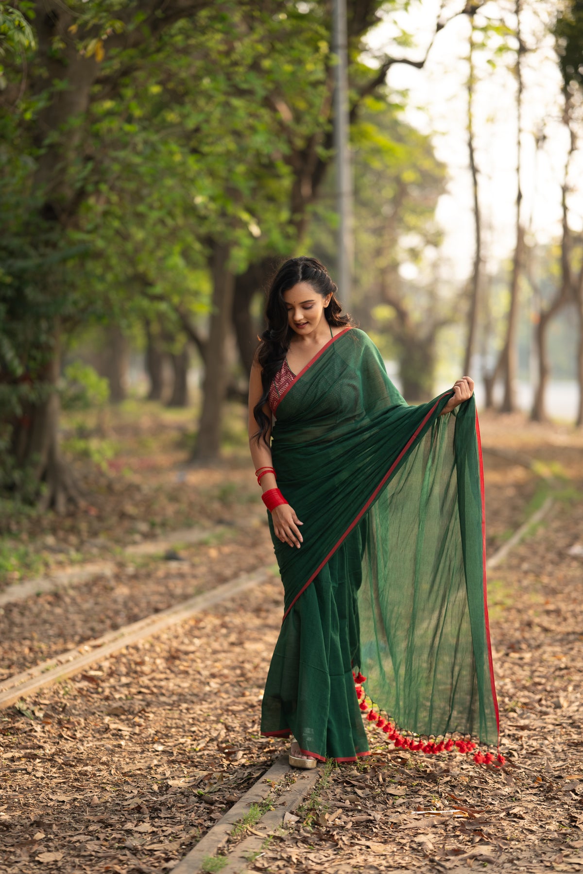Dark green and red mulmul saree