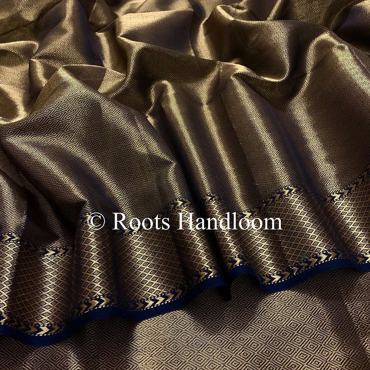 Black and gold Maheshwari with zari pattern all over