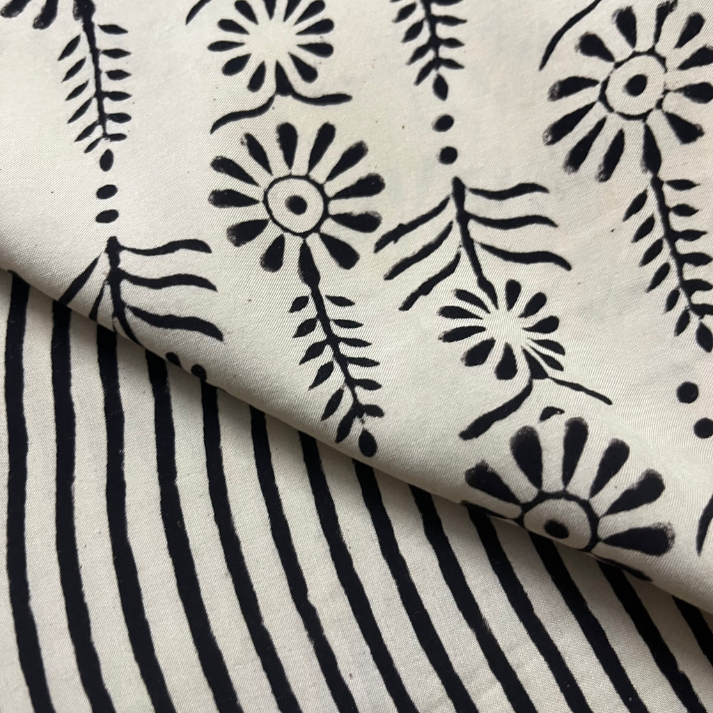 White and black silk saree with block print all over