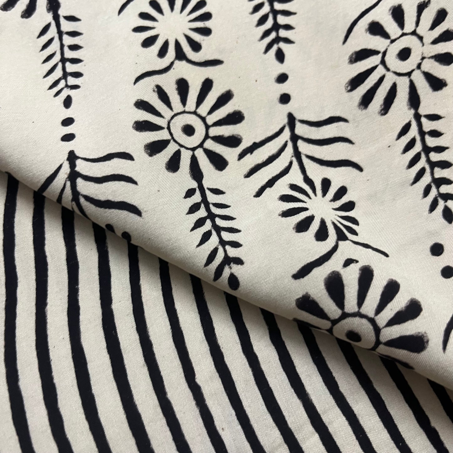 White and black silk saree with block print all over