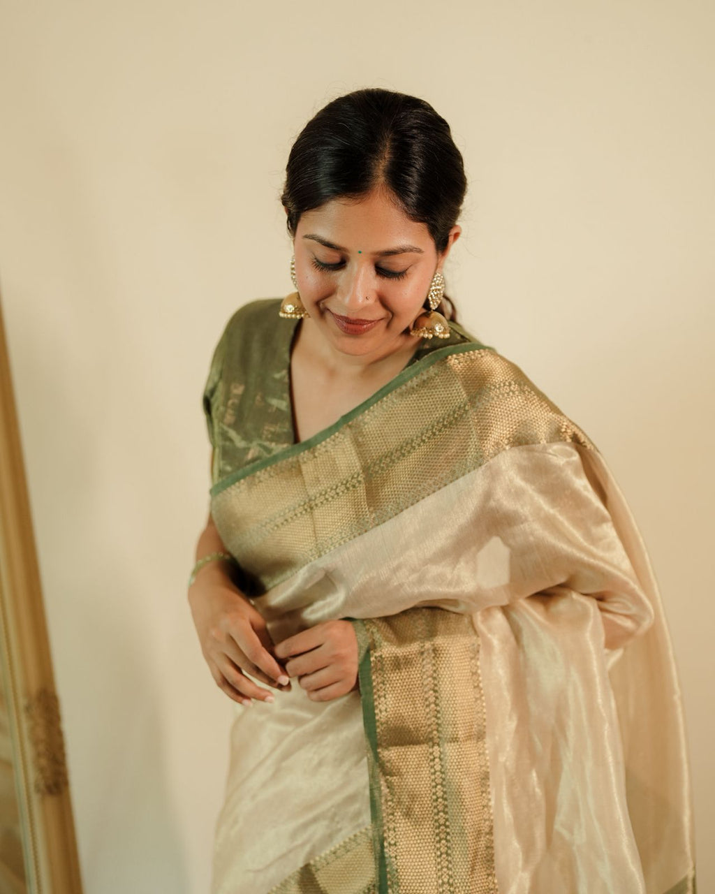 Cream Gold and green Maheshwari tissue silk saree with zari pattern on pallu