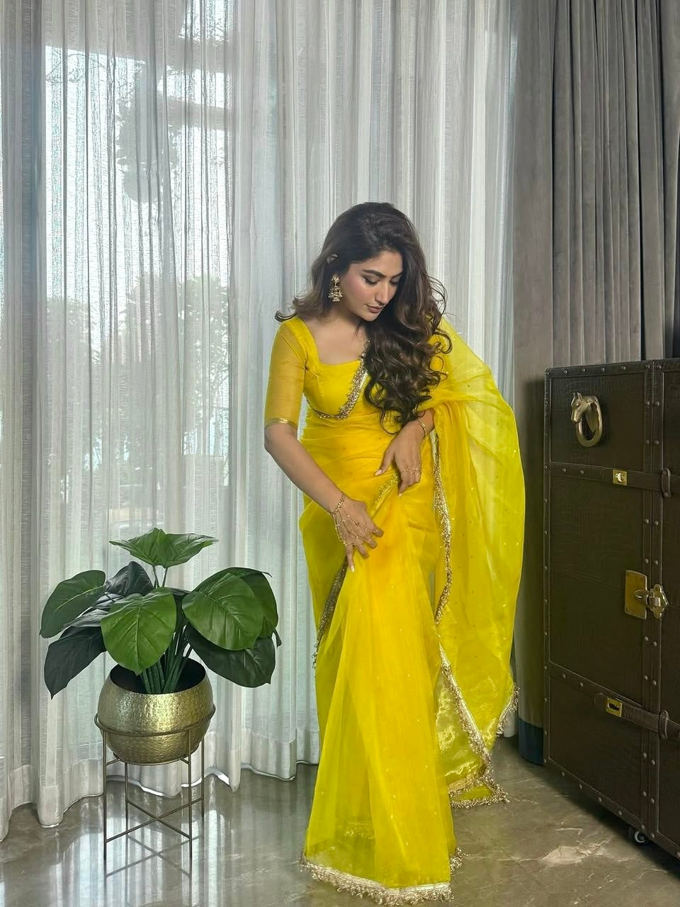 Corn yellow Chanderi silk saree with zari bootis all over