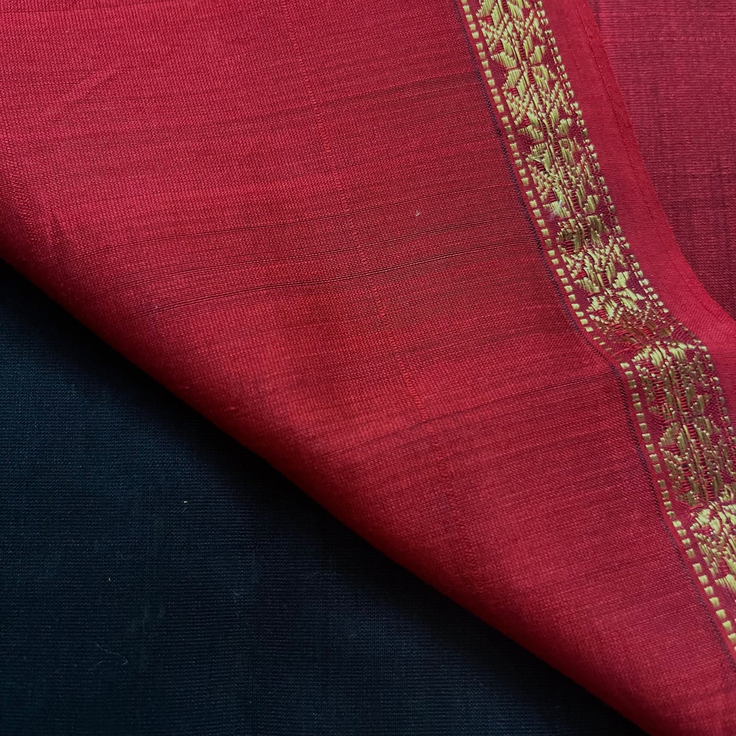 Black and maroon Maheshwari saree with flower bootis all over