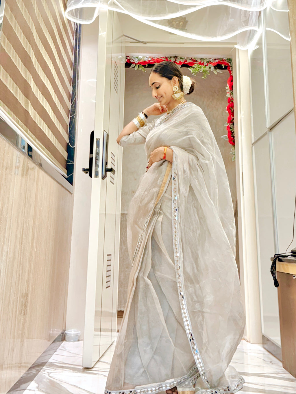 Molten silver and gold chanderi tissue silk saree with mirror work border