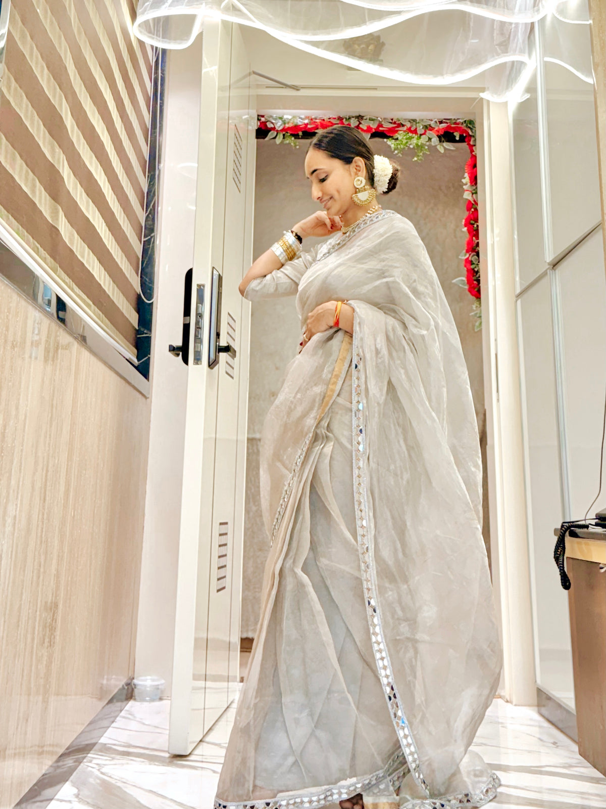 Molten silver and gold chanderi tissue silk saree with mirror work border