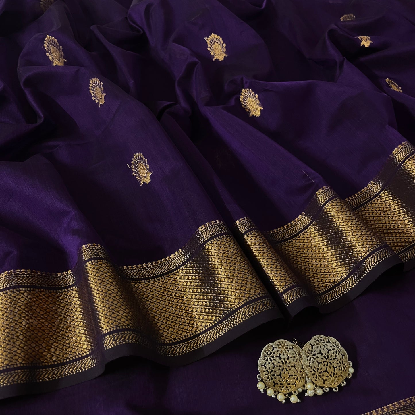 Dark purple Maheshwari saree with zari motifs all over