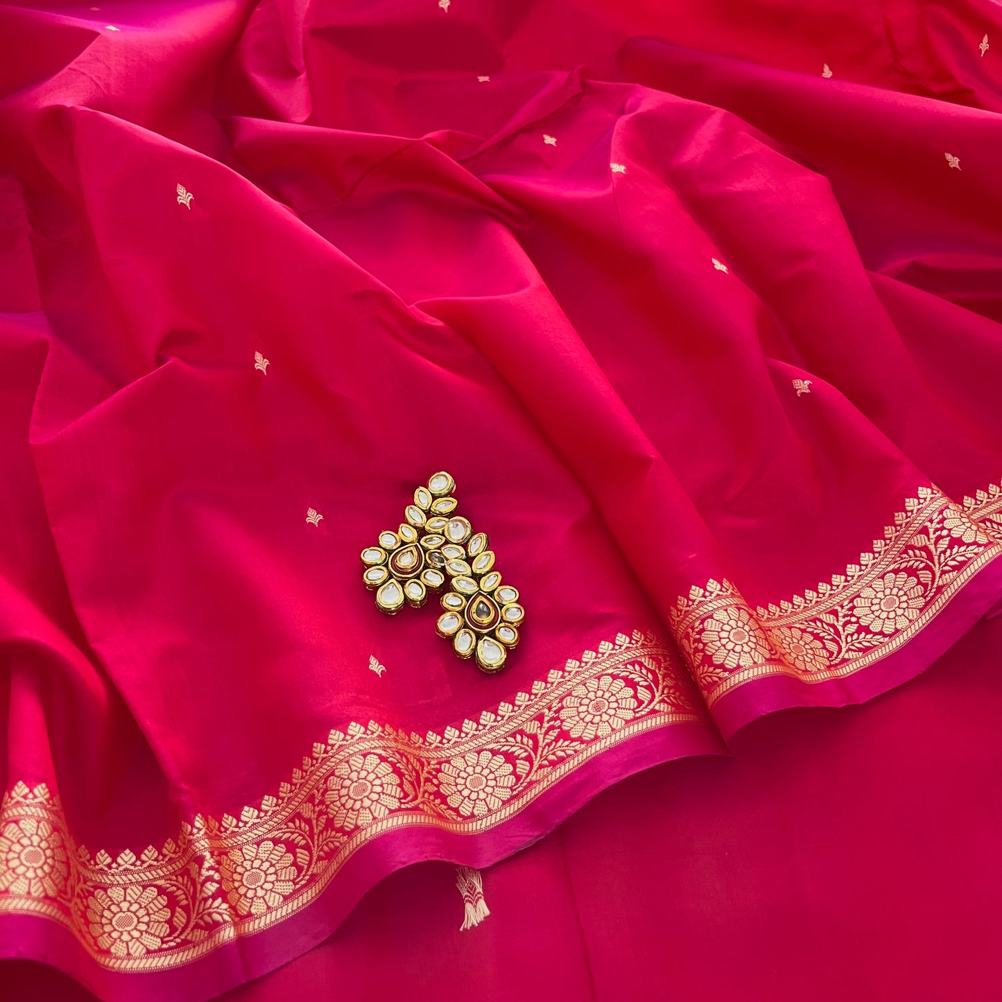 Pinkish Red dual tone Banarasi silk saree with resham bootis all over