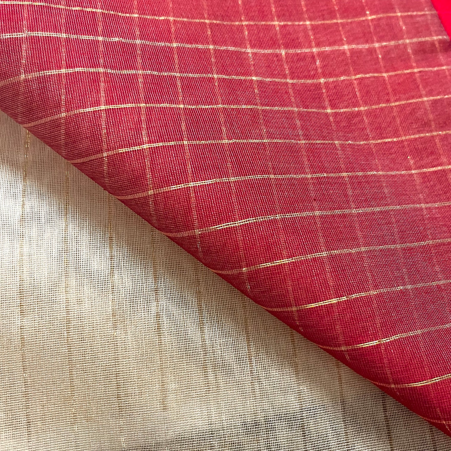 Light beige and red Maheshwari saree with zari lines all over