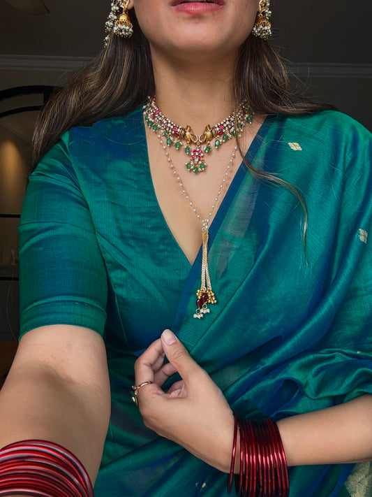Peacock green and blue dual tone Maheshwari saree with zari bootis all over