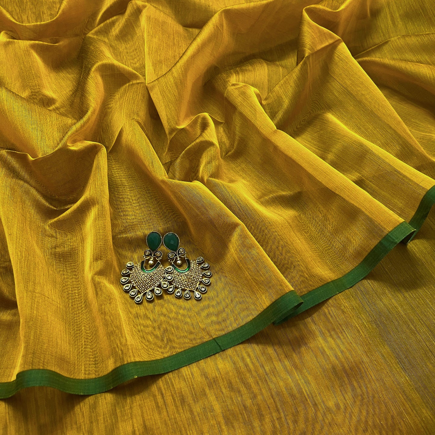 Mustard and green maheshwari saree