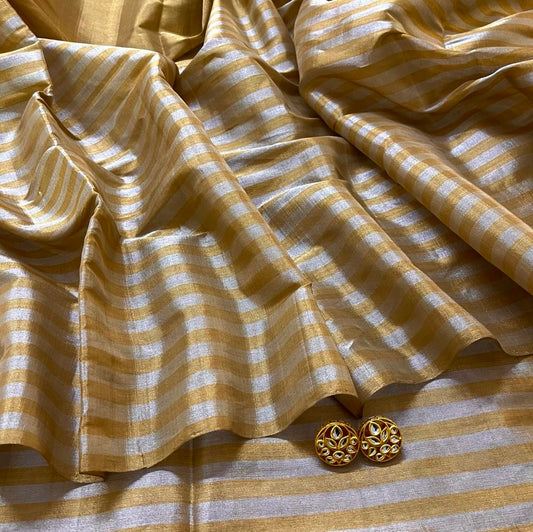 Gold and silver chanderi tissue silk saree with zari stripes all over
