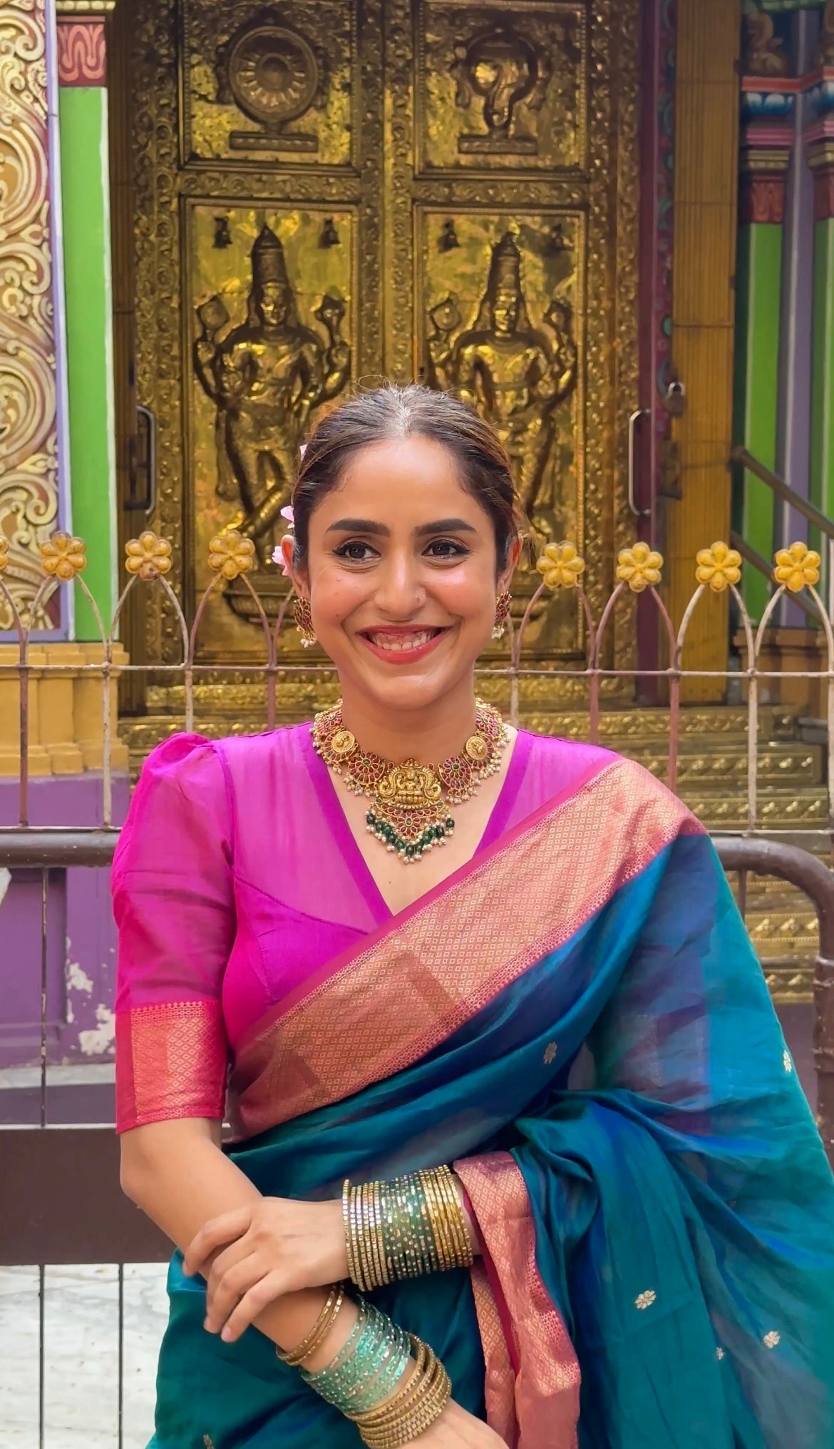 Peacock and Violet dual tone Maheshwari saree with flower motifs on pallu