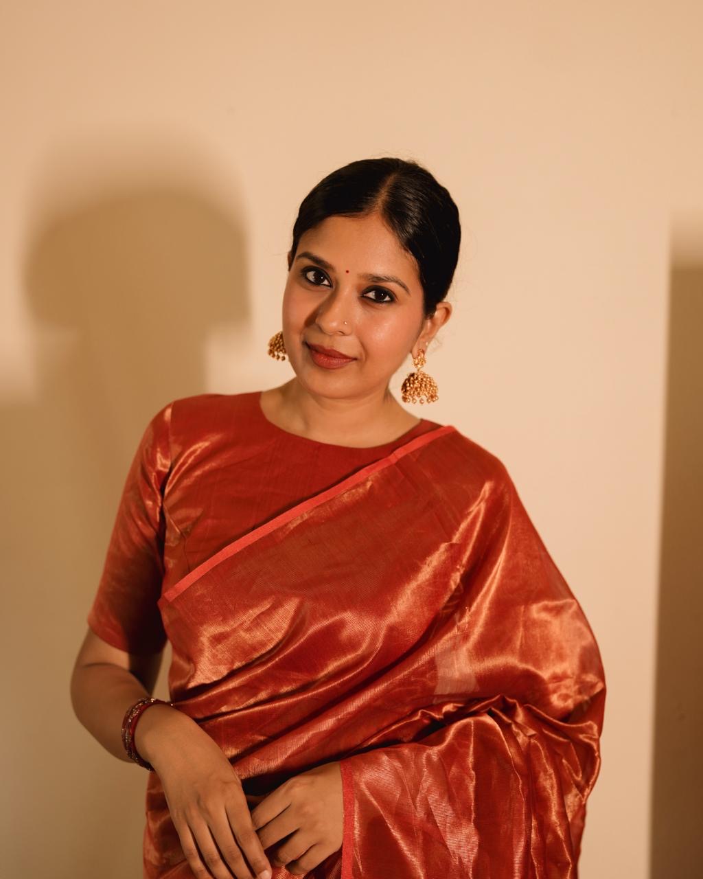 Red Maheshwari saree with zari lines all over