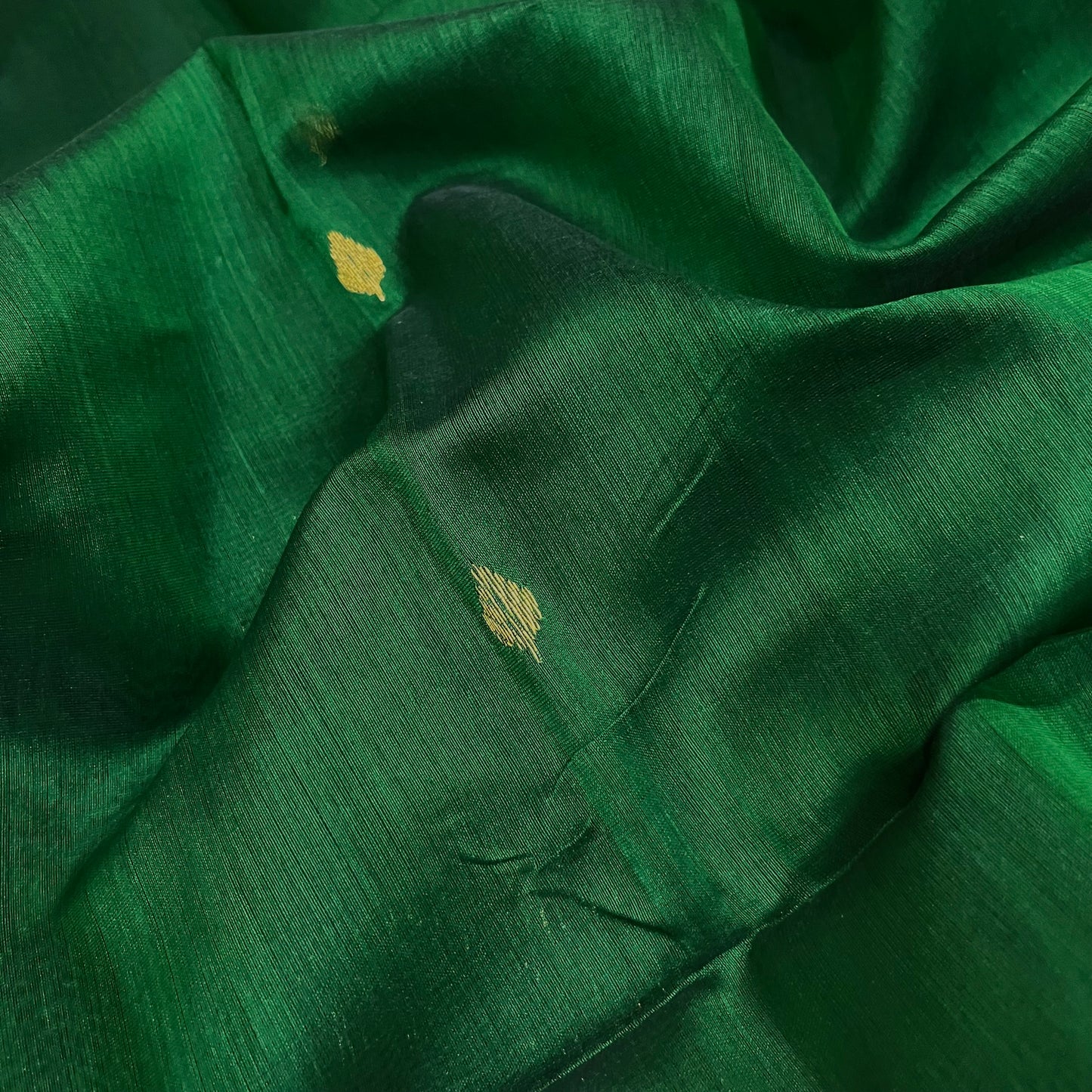 Bottle green Maheshwari saree with zari bootis and zari border