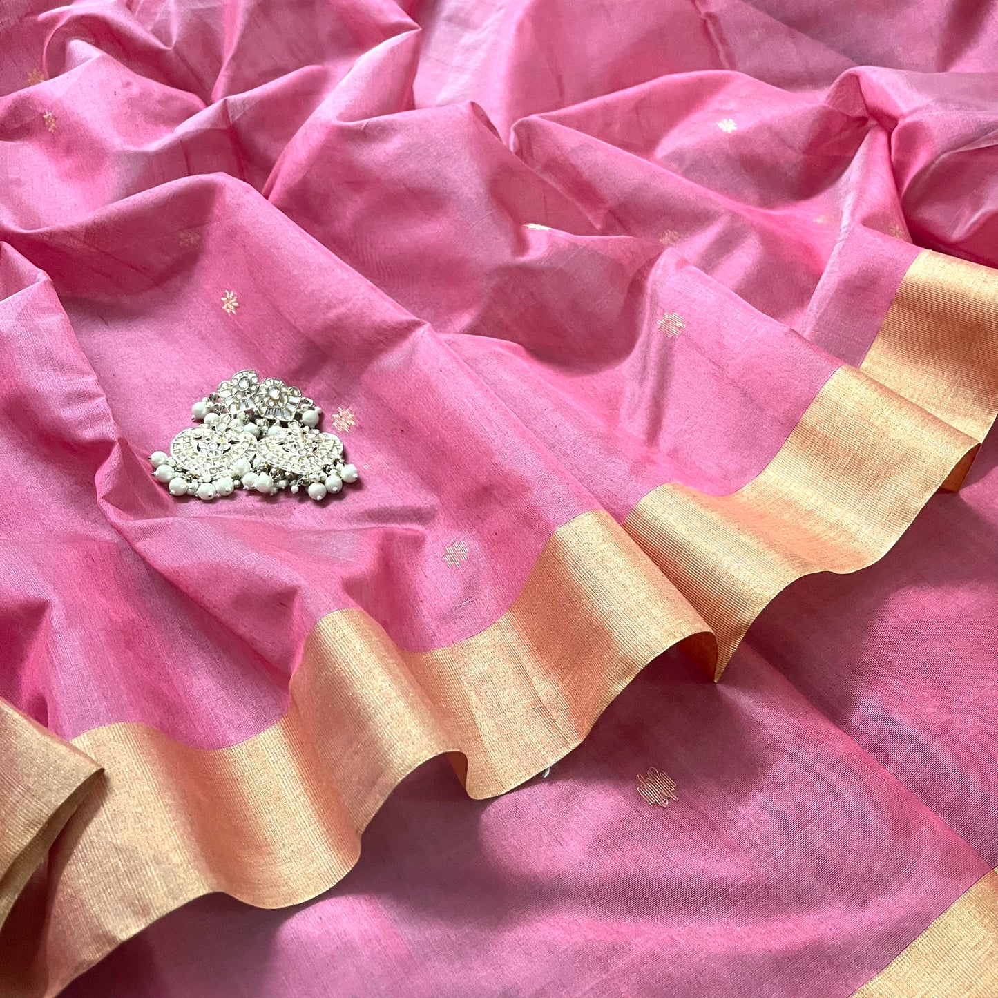 Rose pink Chanderi saree with zari bootis all over and flower motifs on pallu