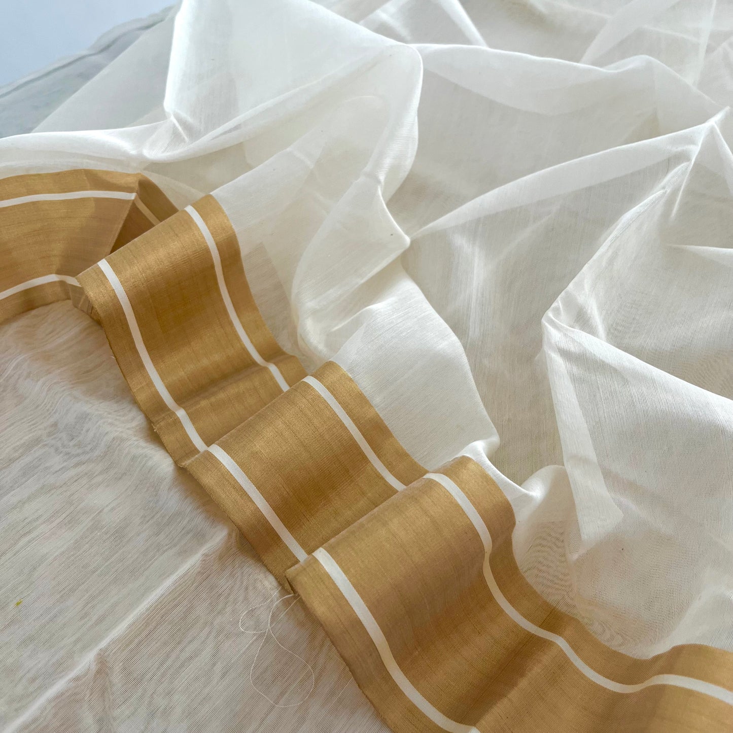Off white Chanderi saree with zari border