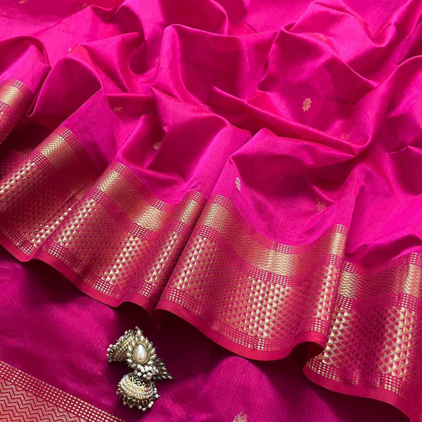 Pink Maheshwari saree with flower bootis all over