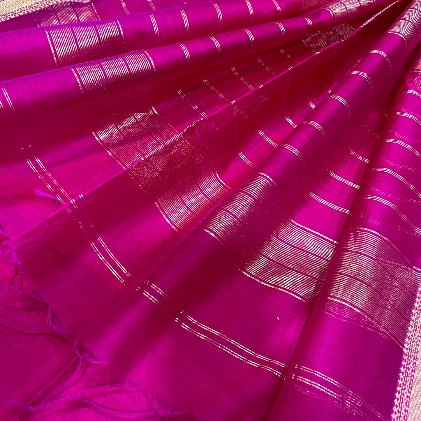 Rani pink Maheshwari saree with zari border