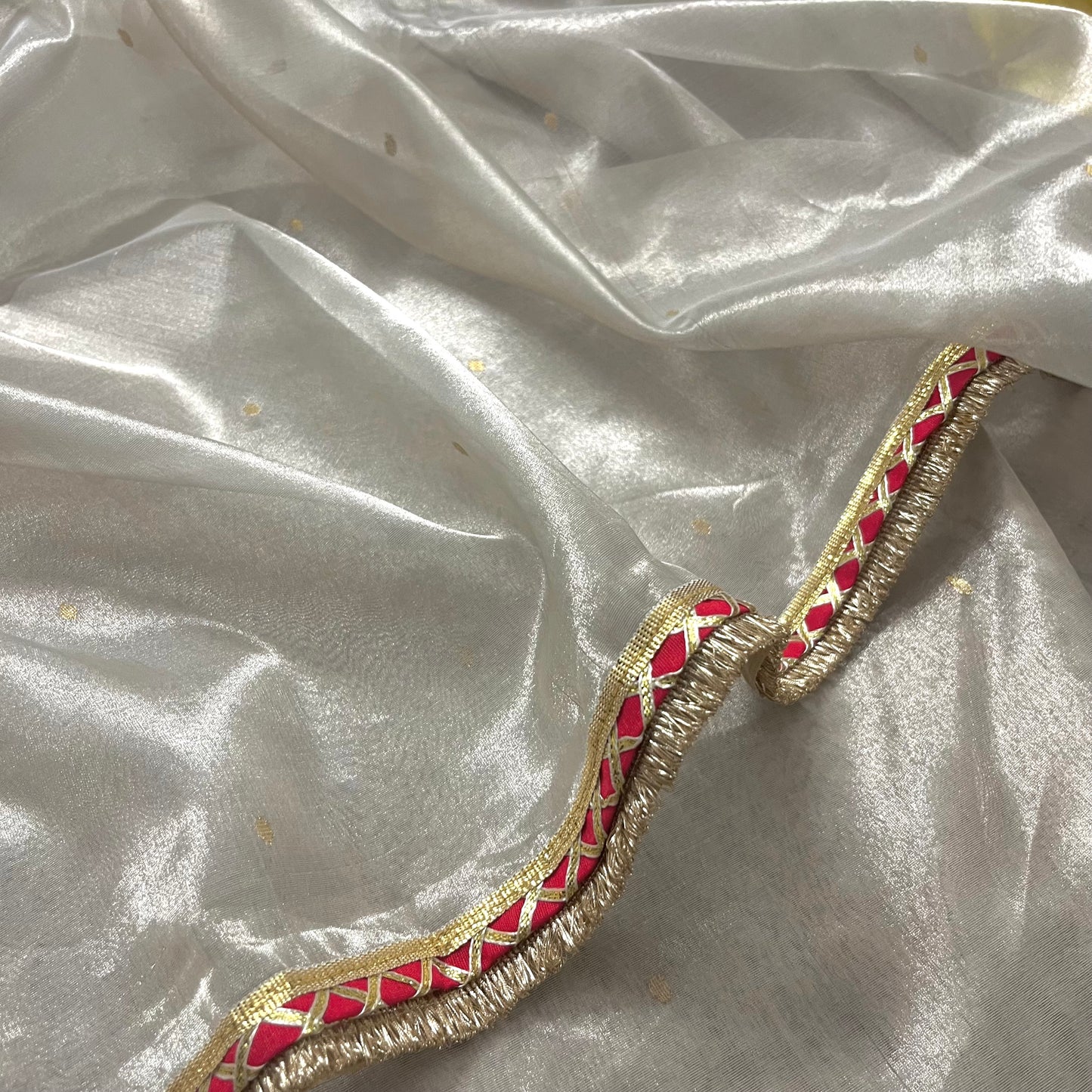 Off white and red Chanderi tissue silk saree with zari bootis all over