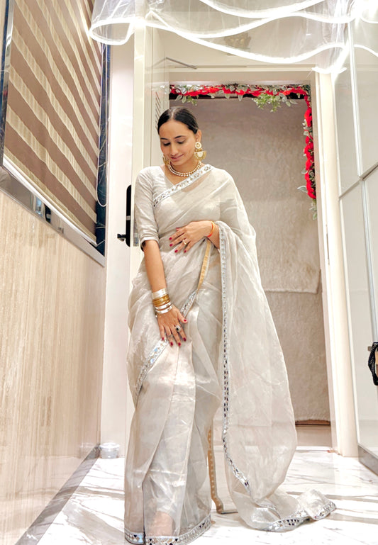 Molten silver and gold chanderi tissue silk saree with mirror work border