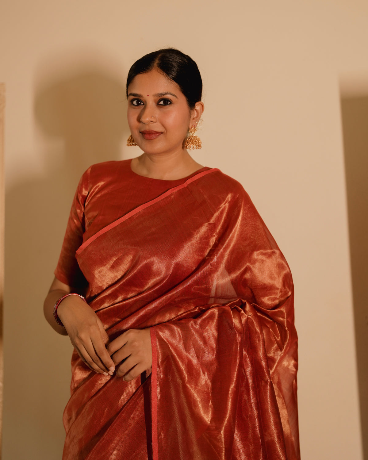 Red Maheshwari saree with zari lines all over