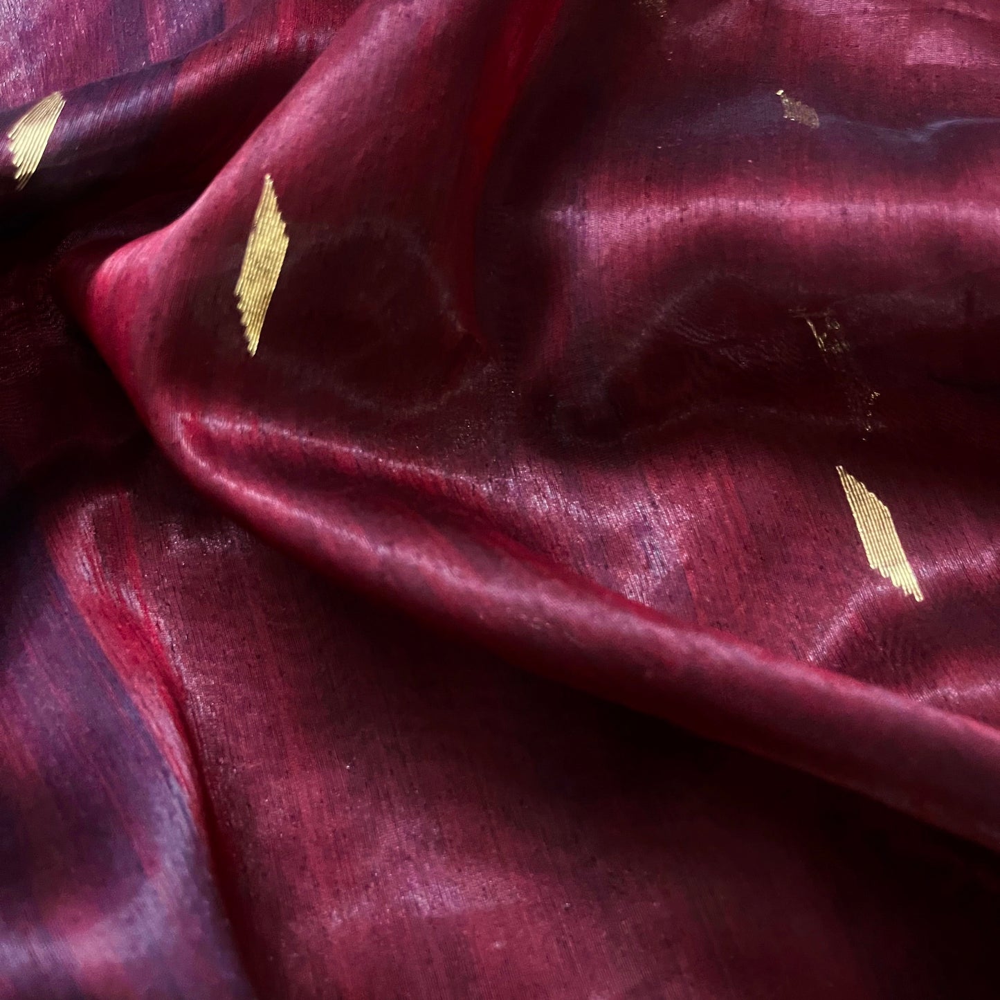 Mahogany Maheshwari tissue silk saree with zari bootis all over