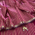 Dark pink Maheshwari saree with zari stripes all over