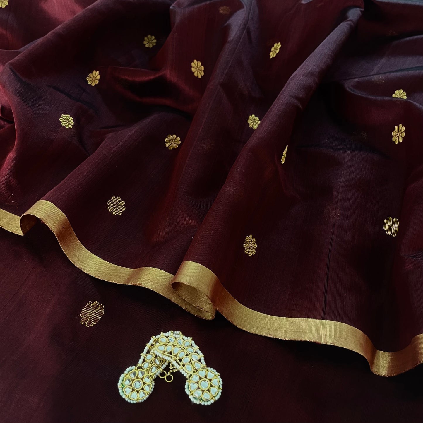 Mahogany Chanderi silk saree with flower bootis all over