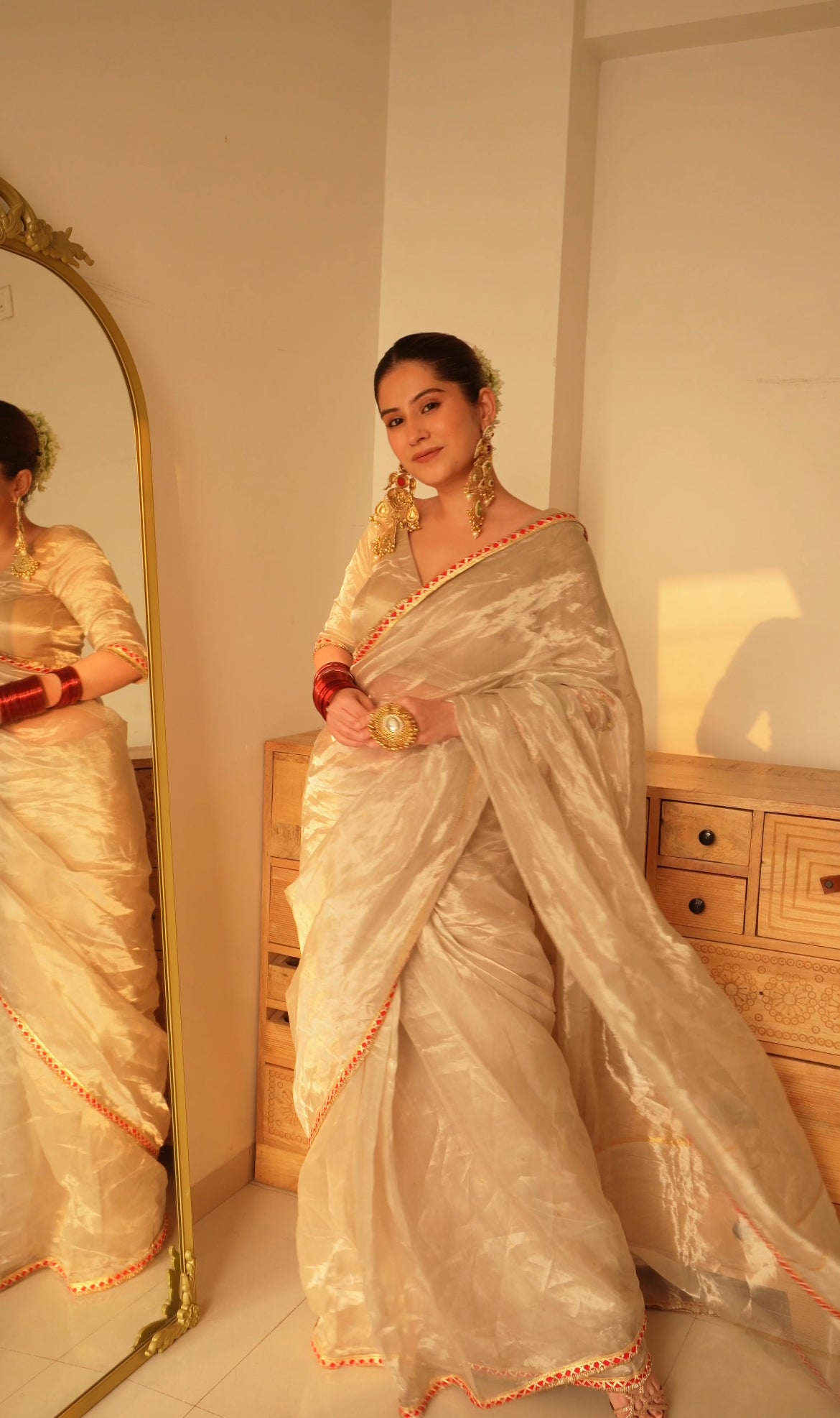 Chantilly cream and red Chanderi tissue silk saree with zari bootis all over