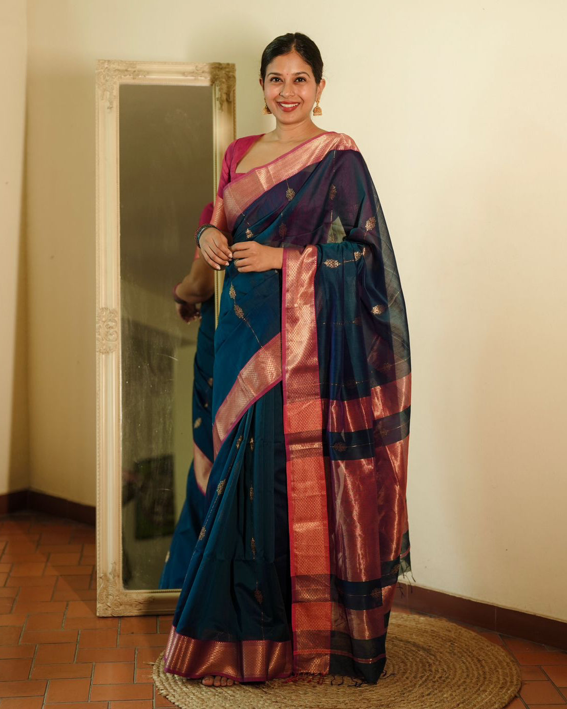 Peacock blue and pink Maheshwari saree with zari motifs all over