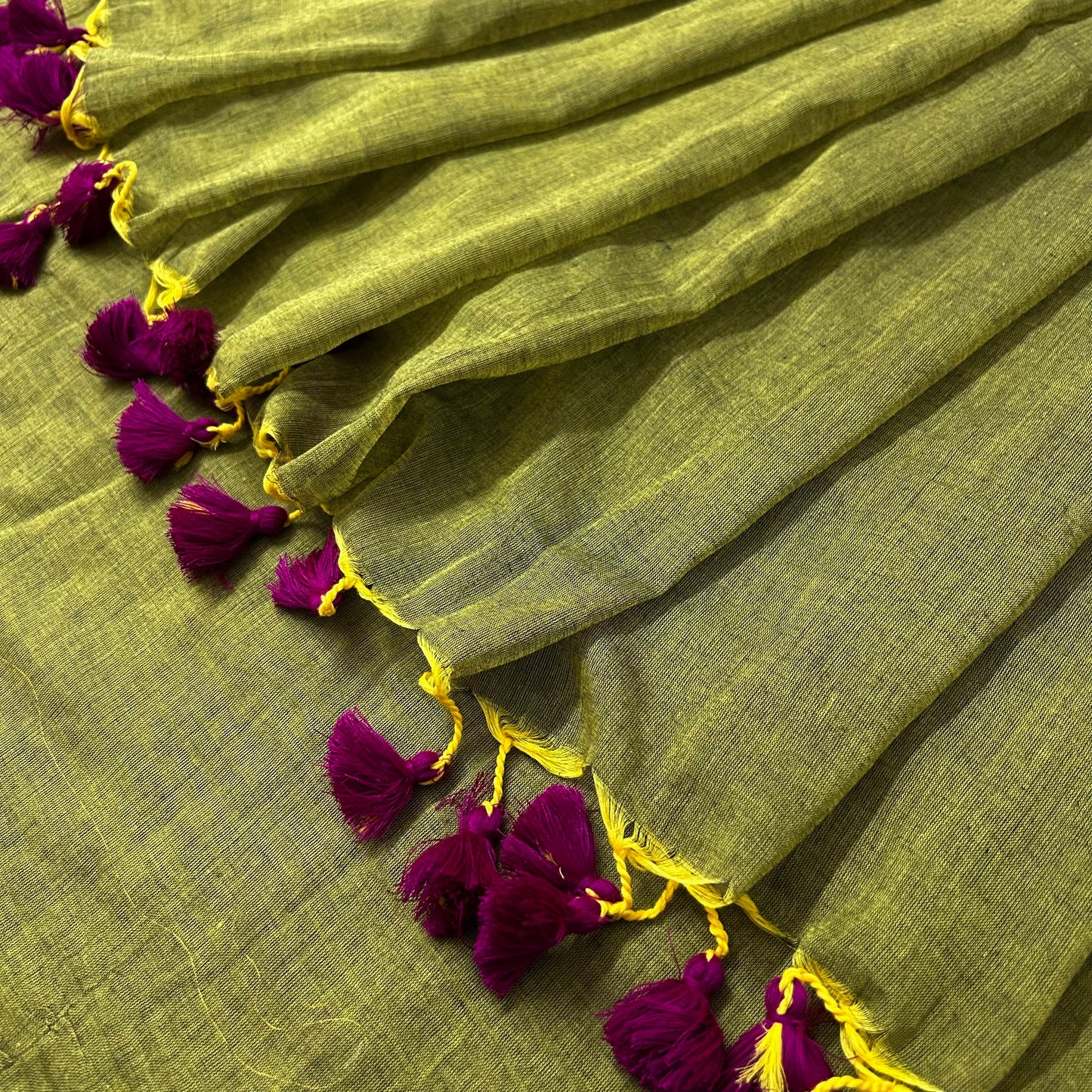 Olive green and pink mulmul saree