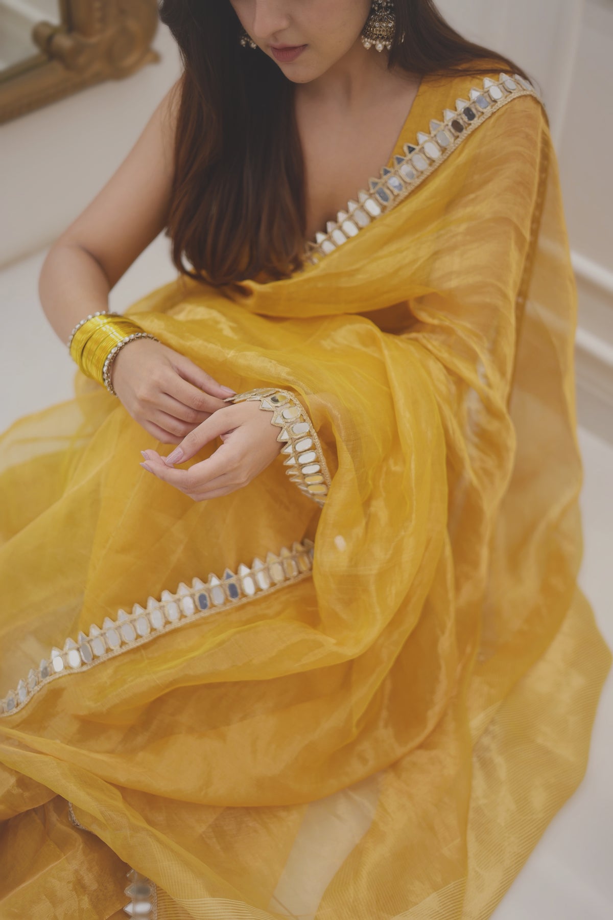 Molten amber gold chanderi tissue silk saree with mirror work border
