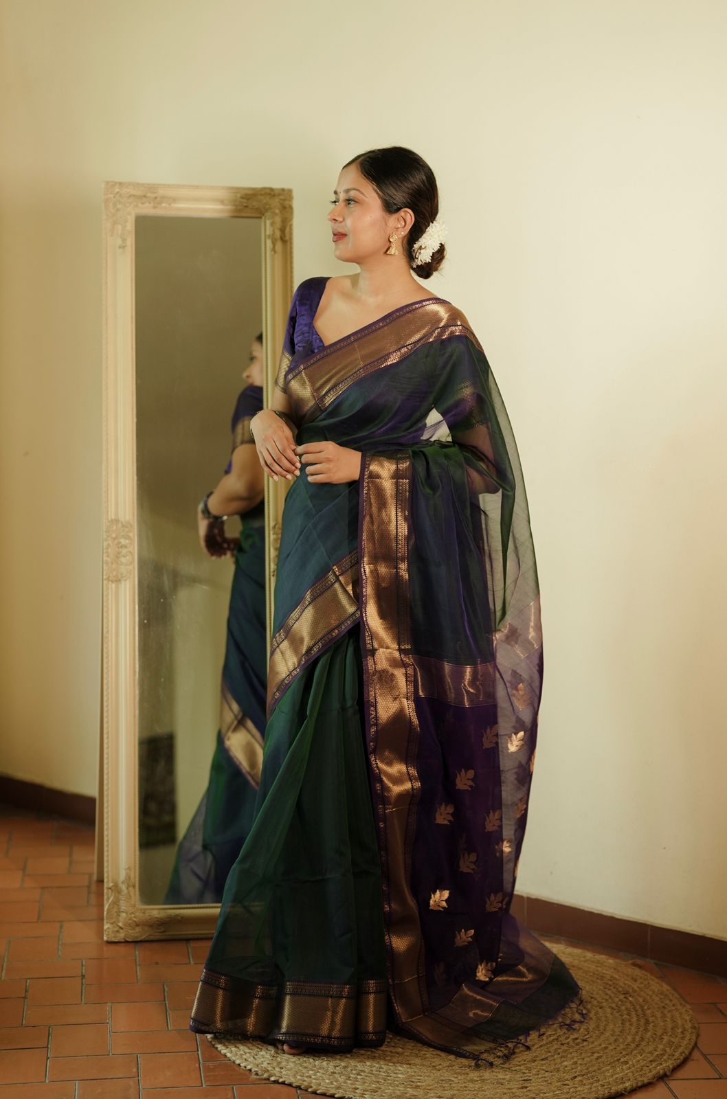 Peacock and purple dual tone Maheshwari saree with flower motifs on pallu