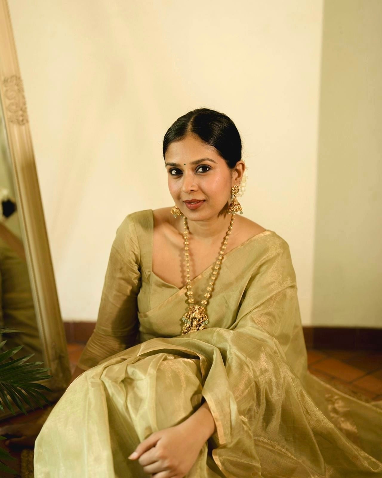 Olive gold Maheshwari tissue silk saree with zari bootis all over