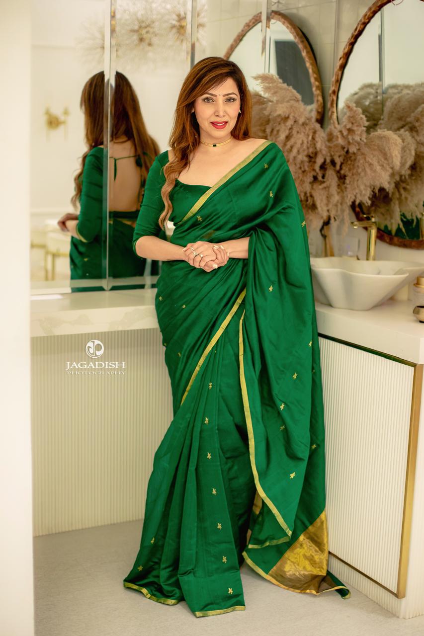 Emerald green chanderi silk saree with flower bootis all over