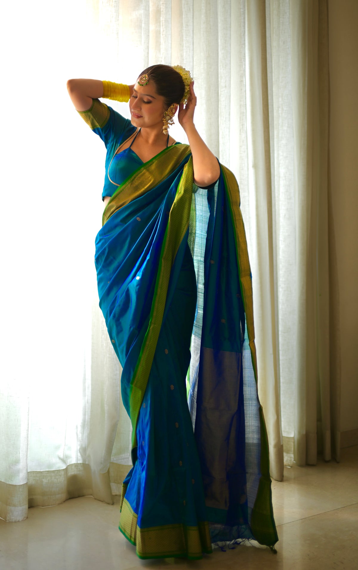 Peacock blue and green dual tone Maheshwari silk saree with zari bootis all over