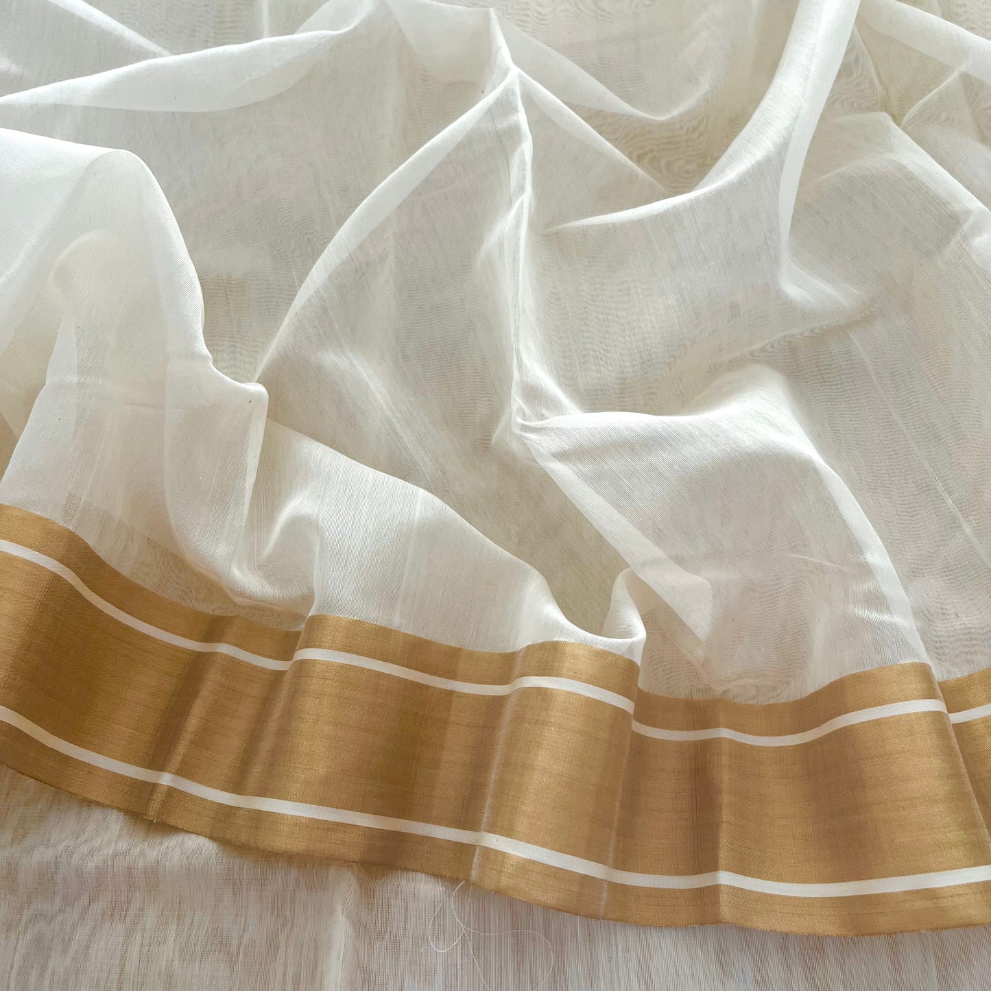 Off white Chanderi saree with zari border