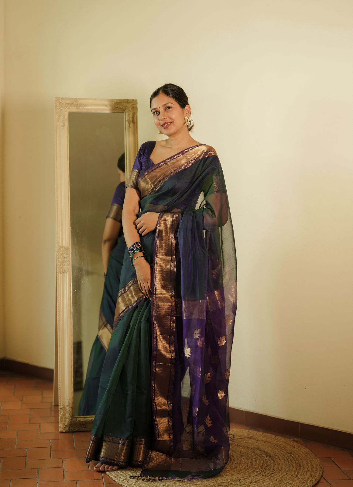Peacock and purple dual tone Maheshwari saree with flower motifs on pallu