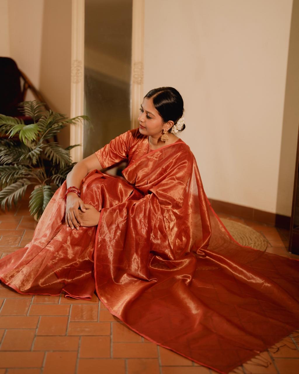 Red Maheshwari saree with zari lines all over