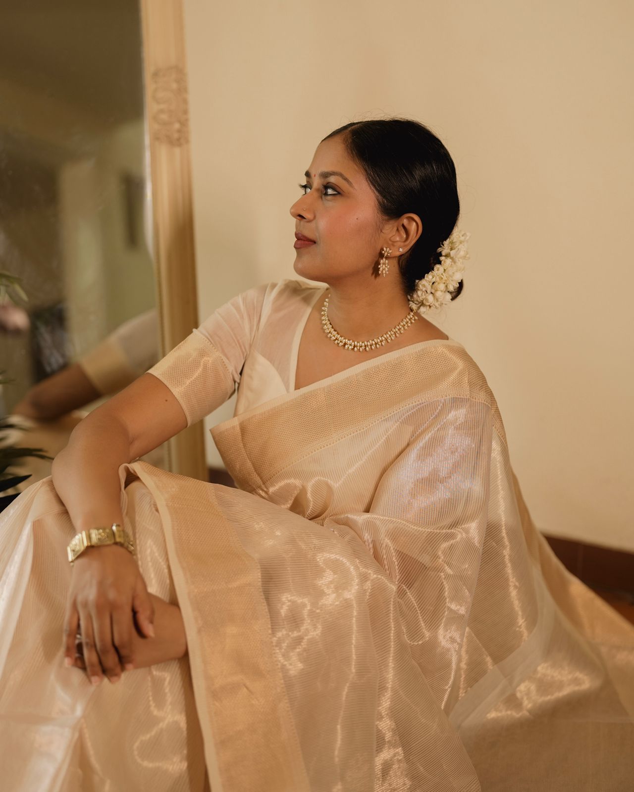 Off white gold Maheshwari saree with zari lines all over