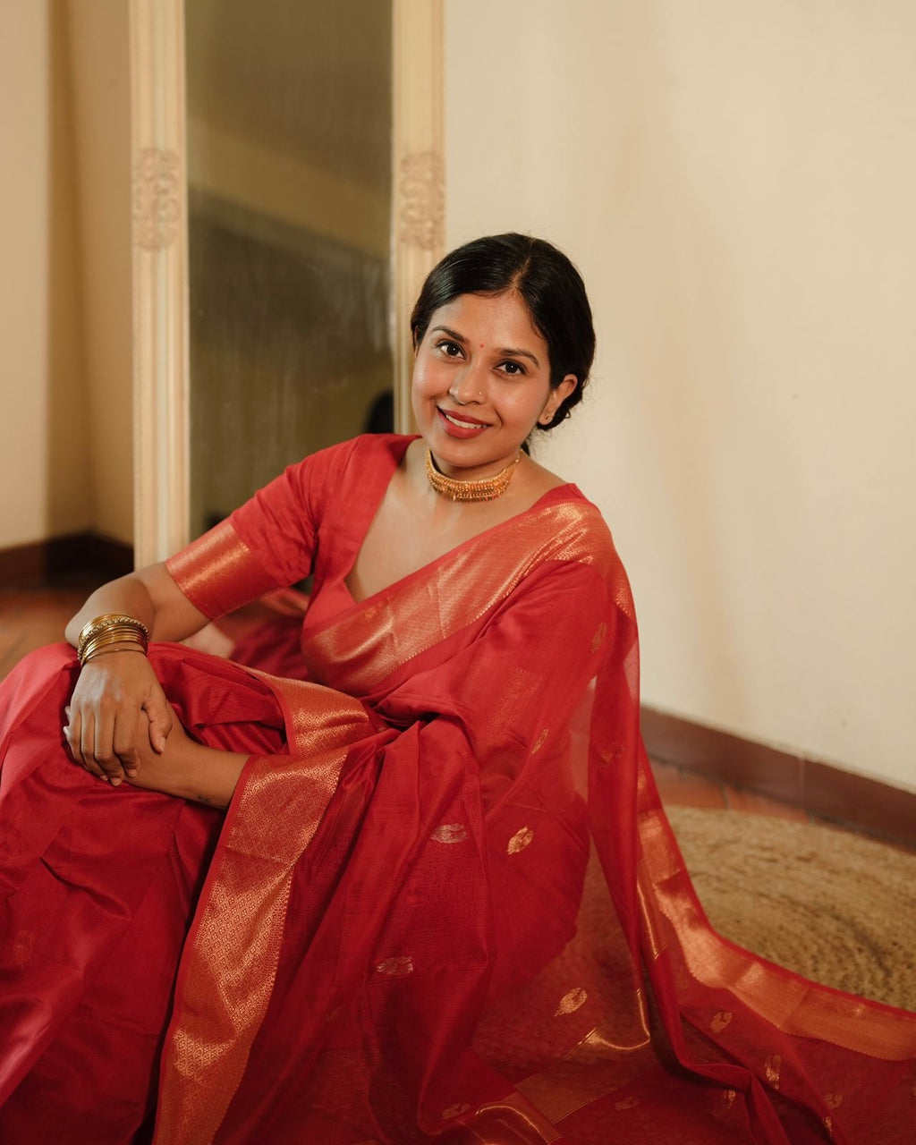 Red Maheshwari saree with morni motifs all over