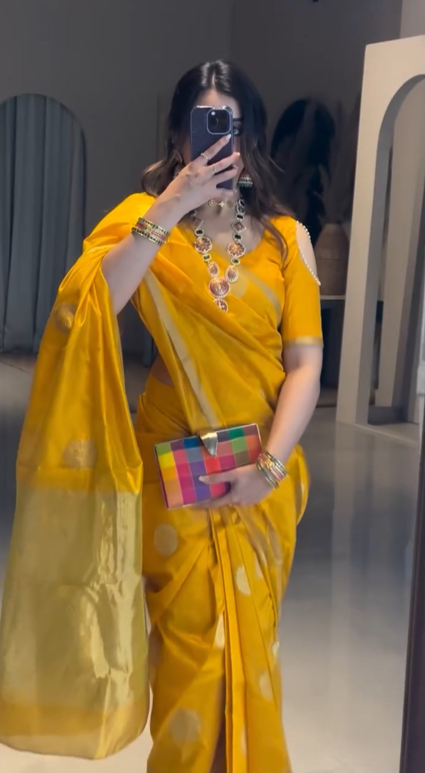 Yellow chanderi silk saree with mor motifs all over