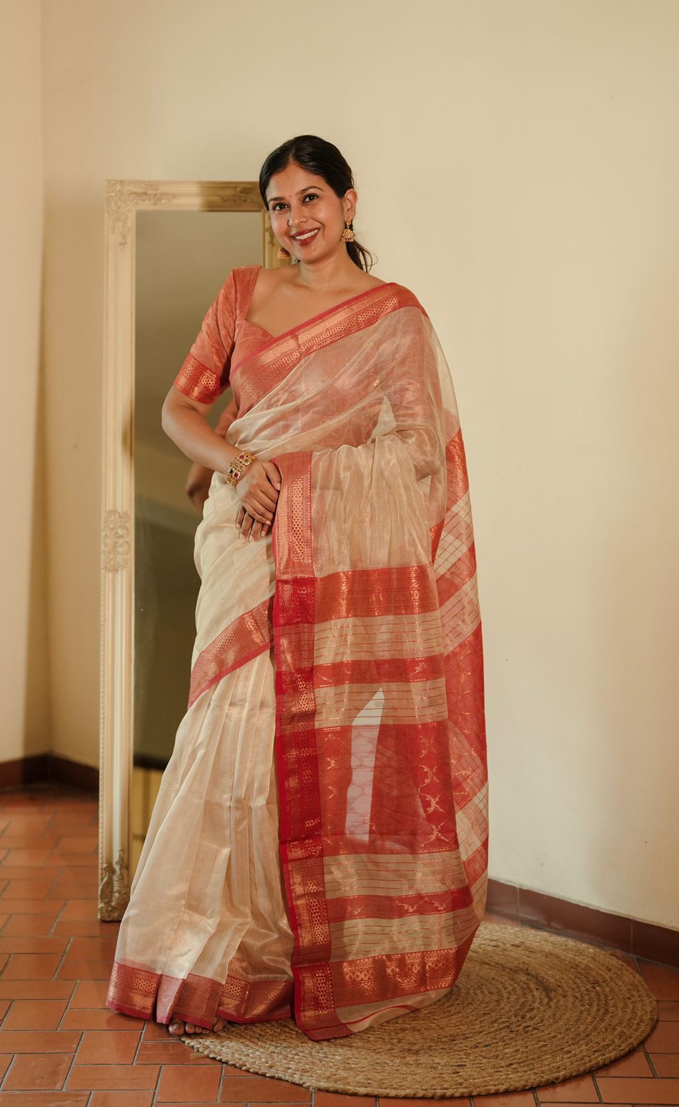 Cream and red Maheshwari tissue silk saree with zari pattern on pallu