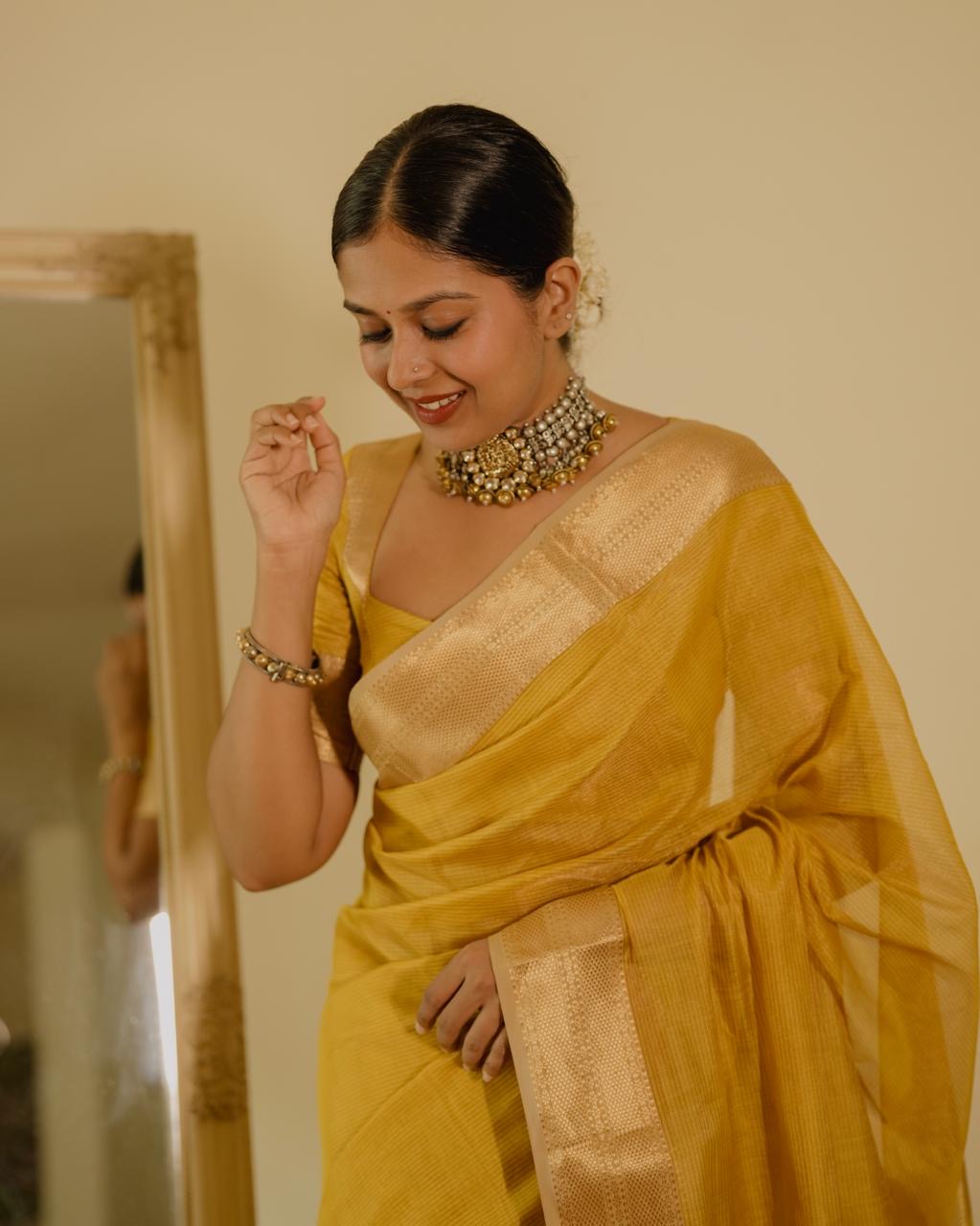 Yellow Maheshwari saree with zari lines all over